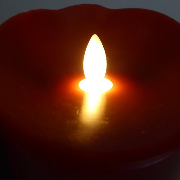 USED ONCE 3.75” x 9.5” MIRAGE RED REAL WAX LED FLAME EFFECT PILLAR CANDLE - Picture 2 of 8